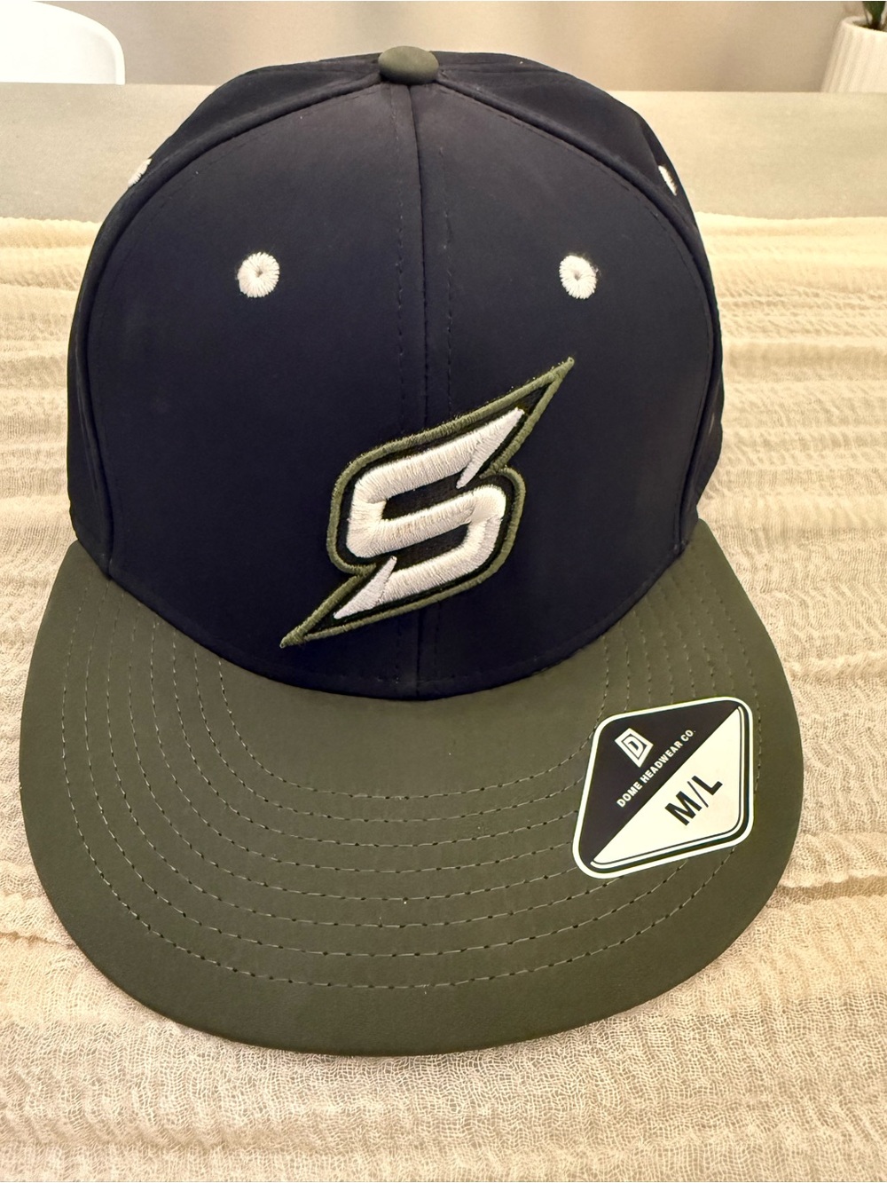 Snapback Cap with 'S' Logo in Navy and Olive